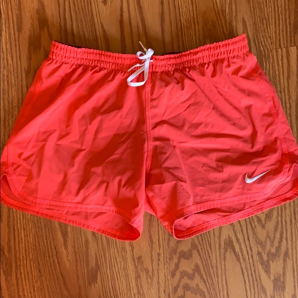 Neon pink nike dry fit running shorts
